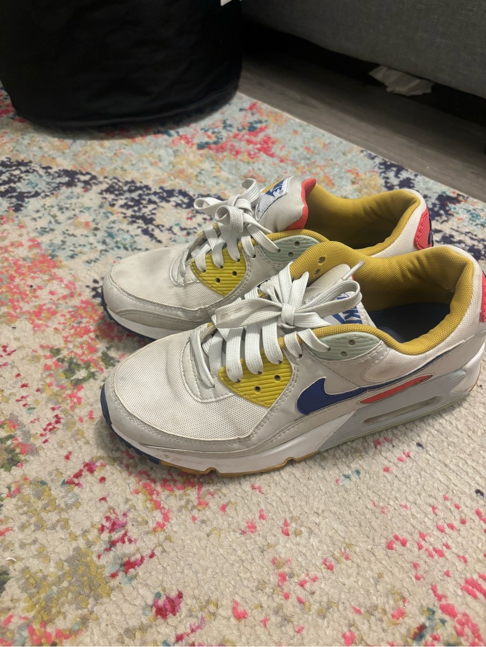 Nike Women's White Sneakers with Blue Swoosh and Yellow Lining